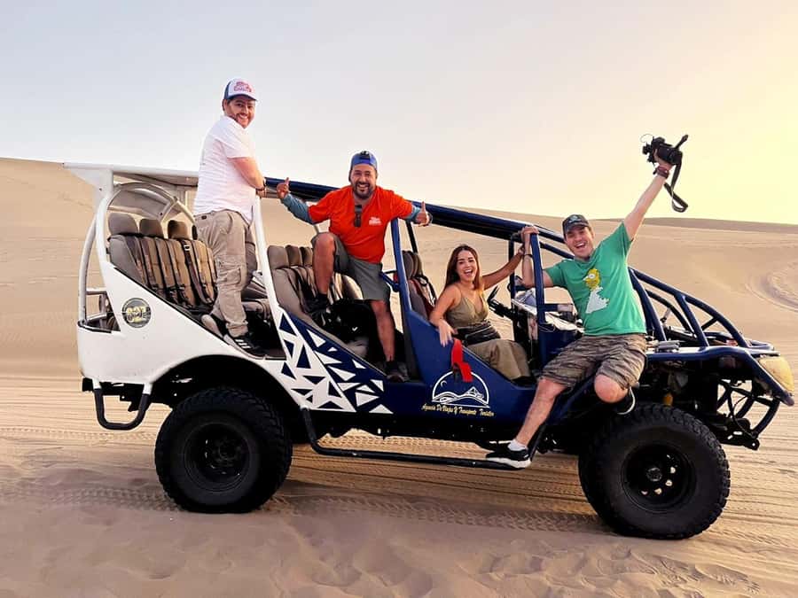 From Lima: Ballestas Islands, Huacachina, and Vineyard Tour - Huacachina Oasis: sandboarding and buggy rides in a real desert setting