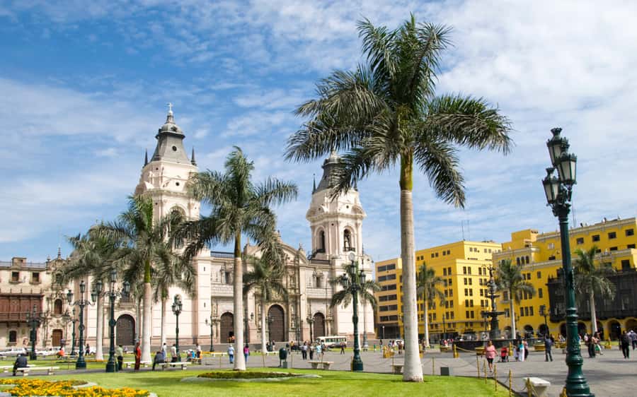 From Lima: City Tour with Catacombs & Pachacamac Inka Ruins - Lima Historic Center: Plaza San Martín and Plaza de Armas, the big-picture start