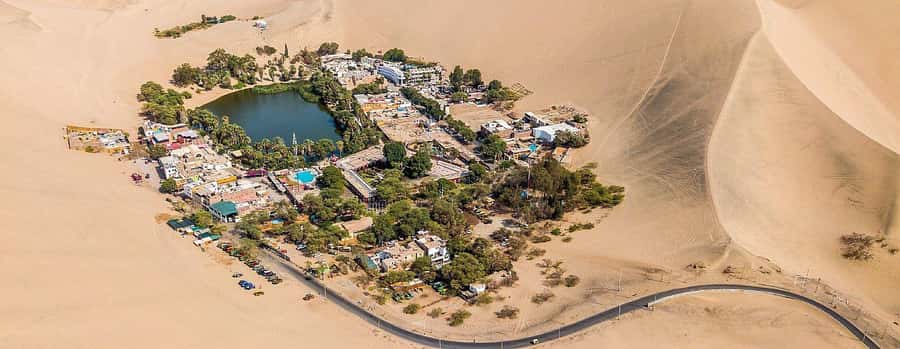 From Lima: Nazca Lines and Ica Desert Day Trip - Traveling from Nazca to Huacachina: the desert shift