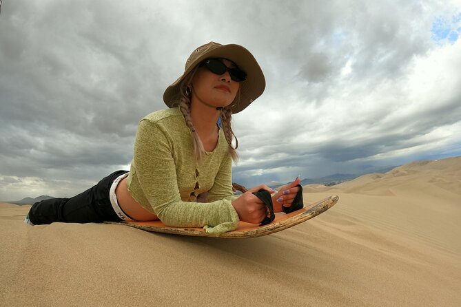 Full day Tour Paracas Ica & Huacachina from Lima. - Huacachina Oasis: tubulares and sandboarding for controlled chaos