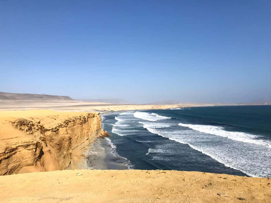 Ica: Ballestas Island & Paracas Reserve Private Tour - Playa Roja and Lagunillas: maroon sand after the cliffs