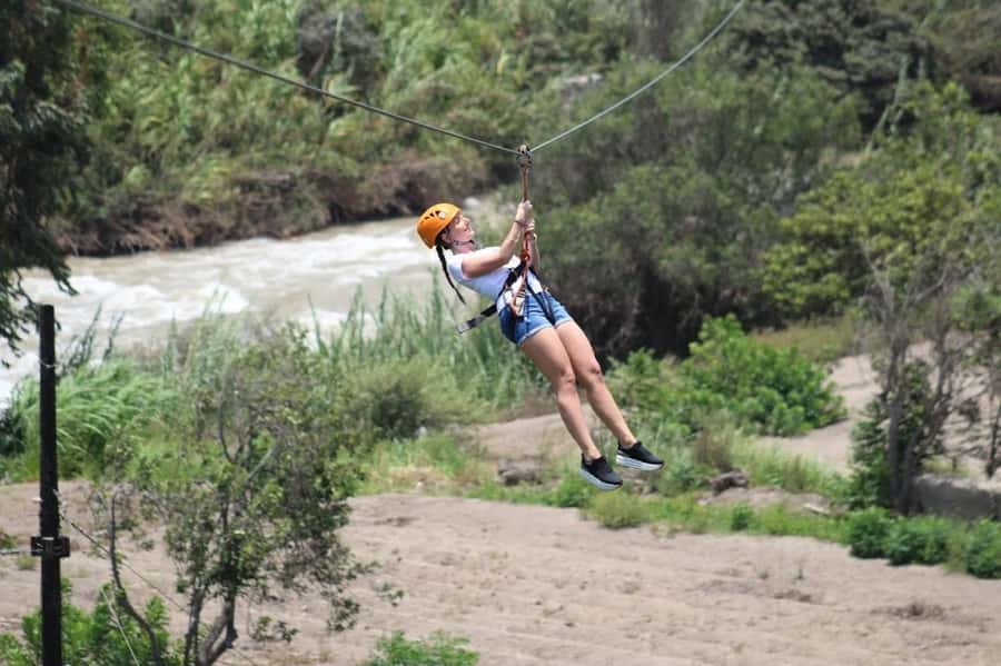 Lima: Lunuhuaná Extreme All In + Cerro Azul + Rafting + ATV + Canopy - Catapalla Bridge views and a quick reset between activities