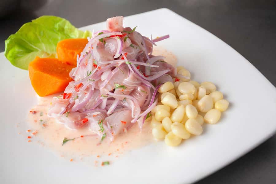 Lima: Market Tour and Cooking Class with Pisco Sour - Surquillo Market fruit tasting: learning flavor before you cook